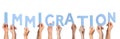 People holding word IMMIGRATION made of cardboard letters on background. Banner design Royalty Free Stock Photo