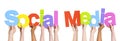 People Holding The Word Social Media Royalty Free Stock Photo