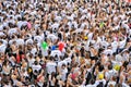 People at the Holi Color Run Party in the streets of the city Royalty Free Stock Photo