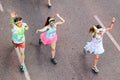 People at the Holi Color Run Party in the streets of the city Royalty Free Stock Photo