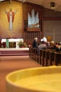 People, holy water in church