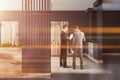 People in hotel, office or apartment block lobby Royalty Free Stock Photo