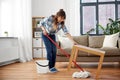 Happy asian woman with mop cleaning floor at home Royalty Free Stock Photo