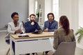 People from human resources commission sitting at table in office during job interview. Royalty Free Stock Photo