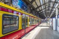 people hurry at Berlins central s-Bahn station at Friedrichstrasse