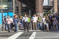 People hurry downtown Manhattan to their offices in early morning in New York