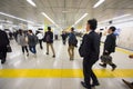 People hurry at Shinjuku Station, Tokyo