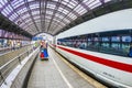 People hurry to the intercity train