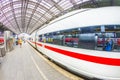 People hurry to the intercity train