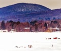 People ice fishing in Berkshire Mountains lake