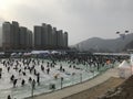 People Ice Fishing on a frozen rive in Korea