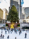 People ice skating in front of Rockefeller Center Christmas Tree - New York, USA Royalty Free Stock Photo