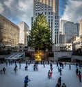 People ice skating in front of Rockefeller Center Christmas Tree - New York, USA Royalty Free Stock Photo