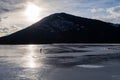People ice skating on the frozen Vermilion lakes Royalty Free Stock Photo