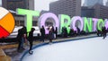 People ice skating on Toronto`s famous ice rink at Nathan Phillips Square