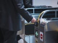 People insert ticket to Ticket Entrance at Train station