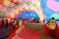 People inside the bag of a half-inflated hot air balloon Royalty Free Stock Photo