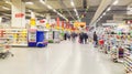 People inside hypermarket Royalty Free Stock Photo