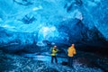 People inside the ice cave Royalty Free Stock Photo