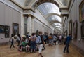 People inside the Louvre Museum