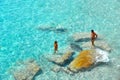 02.09.2018. People inside paradise clear torquoise blue water in Favignana island, Cala Azzura Beach, Sicily South Italy.