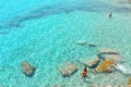 02.09.2018. People inside paradise clear torquoise blue water in Favignana island, Cala Azzura Beach, Sicily South Italy.