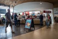 People inside shopping mall centre service station food court open plan area with Costa Coffee Royalty Free Stock Photo