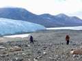 People inspecting the Canada Glacier flowing into Taylor Dry Valley in Antarctica
