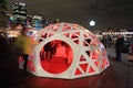 People interacting with Geodesic Light Dome Circular Quay Sydney