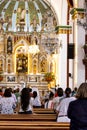 People at the Interior of the Minor Basilica of the Lord of Miracles located in Buga