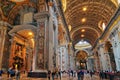People at the interior of the Saint Peter Cathedral in Vatican Royalty Free Stock Photo