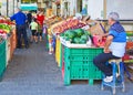 People on an Israel outdoor fruit and vegetable market