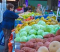 People on an Isral outdoor fruit and vegetable market