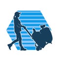 Silhouette of a warehouse worker push a lori chart or hand truck tool transporting sacks. Royalty Free Stock Photo