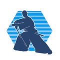 Silhouette of a sword warrior in action pose. Silhouette of kendo martial art pose. Royalty Free Stock Photo
