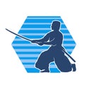 Silhouette of a sword warrior in action pose. Silhouette of kendo martial art pose. Royalty Free Stock Photo