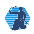 Silhouette of a sword warrior in action pose. Silhouette of kendo martial art pose. Royalty Free Stock Photo