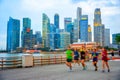 People jogging at Singapore embankment