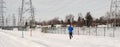 People jogging in a snowmobile trail in Laval