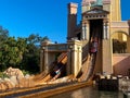 People on the Journey to Atlantis Roller Coaster water ride at SeaWorld speeding around the track and splashing into the water Royalty Free Stock Photo