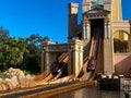 People on the Journey to Atlantis Roller Coaster water ride at SeaWorld speeding around the track and splashing into the water Royalty Free Stock Photo