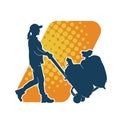Silhouette of a warehouse worker push a lori chart or hand truck tool transporting sacks. Royalty Free Stock Photo