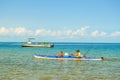 People Kayaking and canoeing in pristine and turquoise water at portuguese Island near Maputo Mozambique Royalty Free Stock Photo