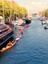 People kayaking on the Copenhagen shipping channel in Christianshavn district