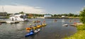 People kayaking in sunny summer day, Pavilosta, Latvia