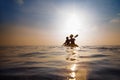 People kayaking at sunset Royalty Free Stock Photo