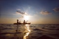 People kayaking at sunset Royalty Free Stock Photo