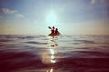 People kayaking at sunset Royalty Free Stock Photo