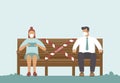 People keep social distance on wooden bench in the park due to coronavirus COVID-19 outbreak Royalty Free Stock Photo