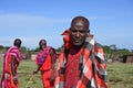 People of Kenya. Portrait of Maasai man in traditional colorful clothing, African Kenya